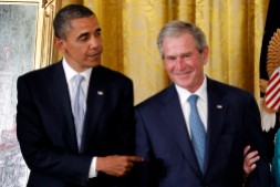 President Barack Obama points to former President George W. Bush during a ceremony to unveil his official portrait, Thursday, May 31, 2012, in the East Room at the White House in Washington. (AP Photo/Charles Dharapak)