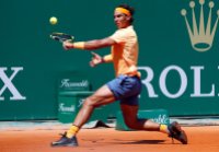 Tennis - Monte Carlo Masters - Monaco, 13/04/2016. Rafael Nadal of Spain plays a shot to Aljaz Bedene of Britain. REUTERS/Eric Gaillard
